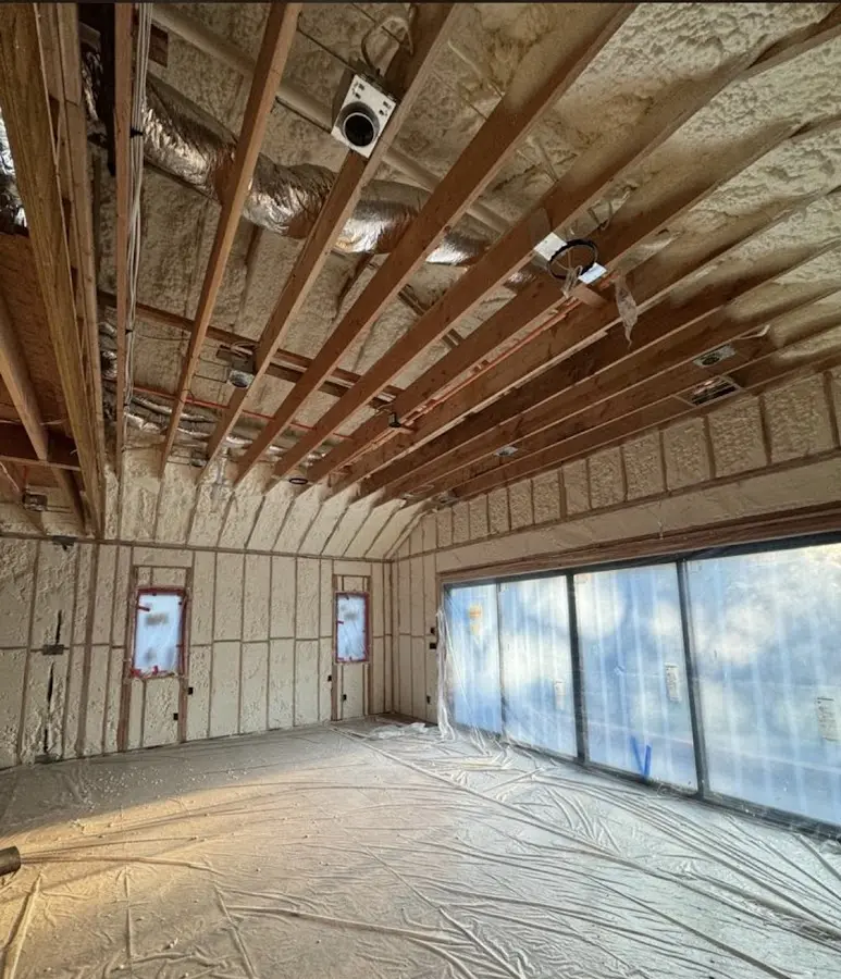 Interior walls and ceiling insulated with spray foam during new construction in East Whittier